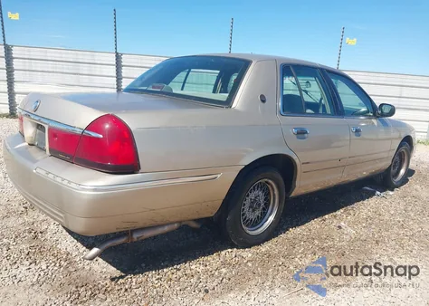 1999 Mercury Grand Marquis Gs z USA, uszkodzony, nr VIN 2MEFM74W1XX605225